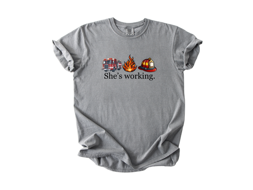 "She's Working" - Firefighter Unisex Tee